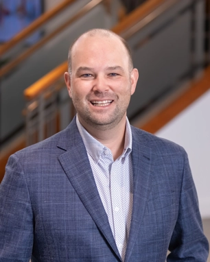 portrait of a smiling person in professional attire